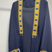 Navy blue chiffon abaya dress for women with gold embroidered trim and decorative tassels
