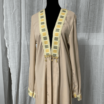 Beige chiffon abaya dress for women with decorative yellow and green embroidered trim on collar and cuffs