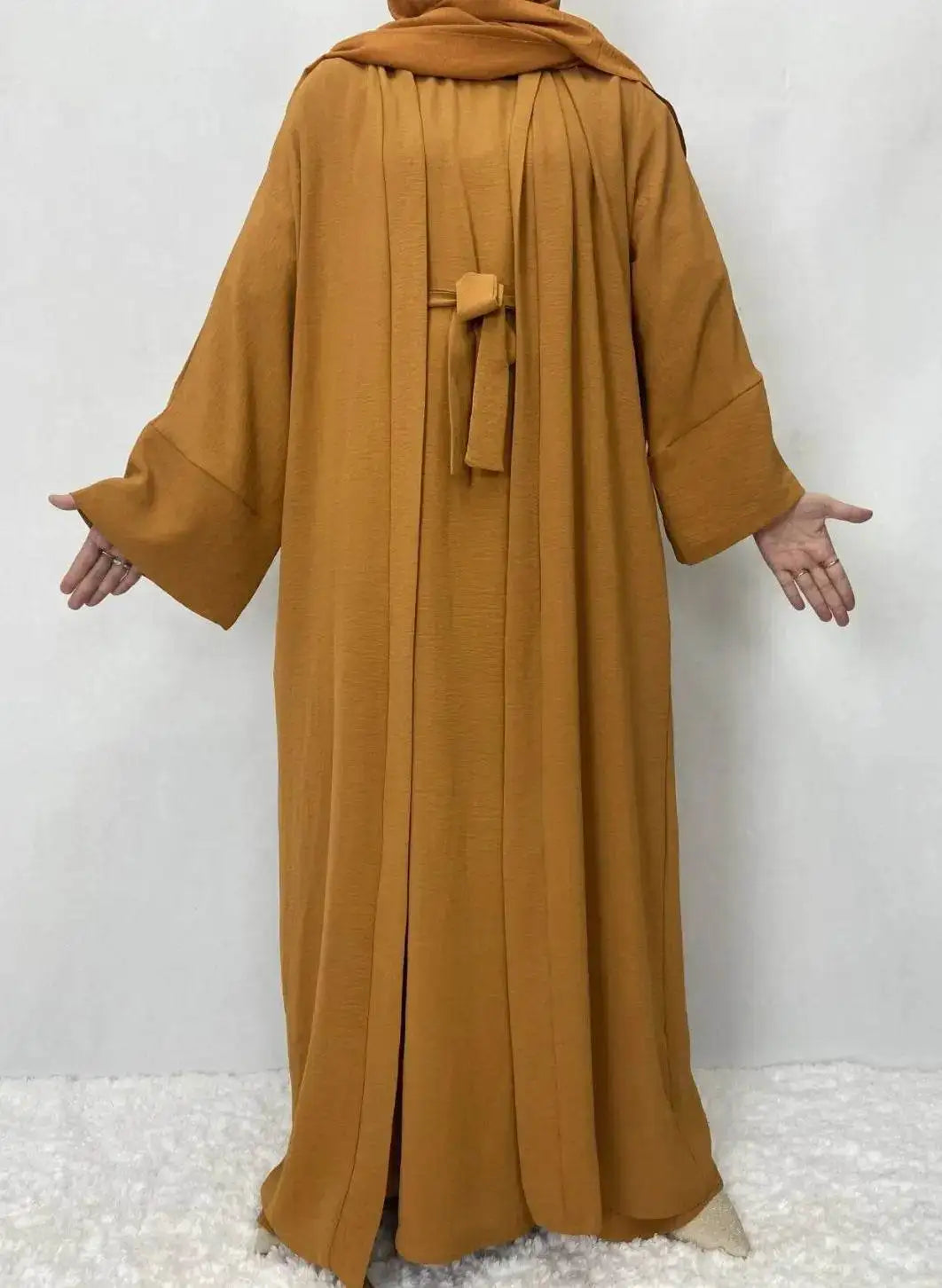 Fabaya UK cotton linen abaya set in mustard yellow with wide sleeves and front tie detail