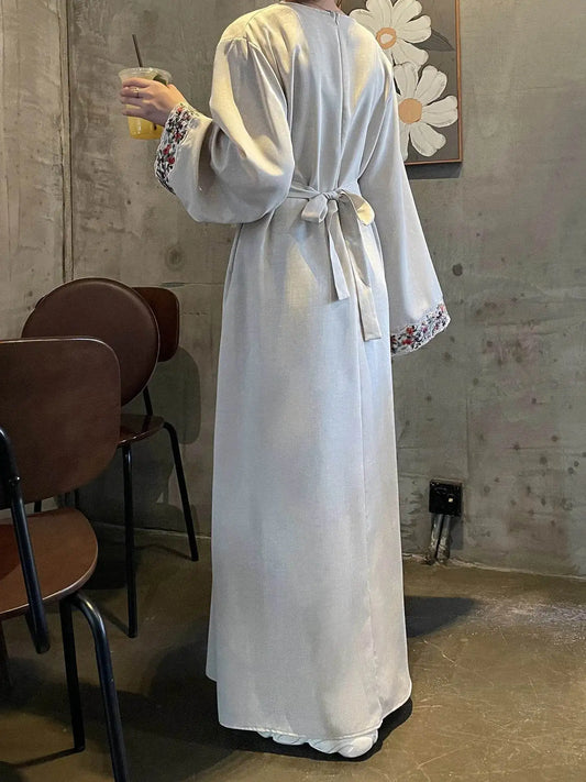 Fabaya UK cotton linen modest dress in light color with embroidered cuffs and waist tie detail