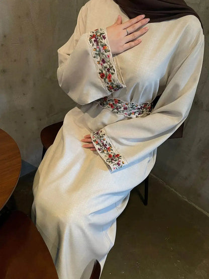 Fabaya UK cotton linen modest dress with floral embroidery on cuffs and waist in a beige color