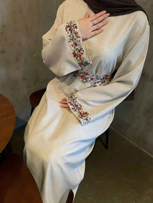 Fabaya UK cotton linen modest dress with floral embroidery on cuffs and waist in a beige color