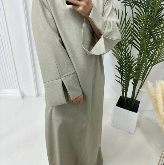 Fabaya UK luxury linen abaya in light beige with wide cuffs and relaxed fit styling