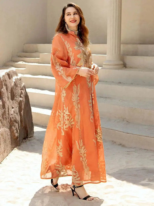 Fabaya UK Moroccan embroidered abaya dress in orange with intricate gold floral patterns and high collar