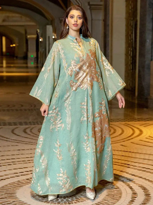 Moroccan embroidered abaya dress in soft green with gold floral designs and wide sleeves by Fabaya UK