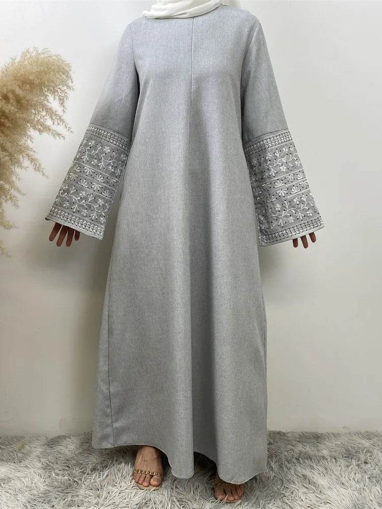 Fabaya UK stylish muslim abaya for women in light gray with embroidered wide sleeves