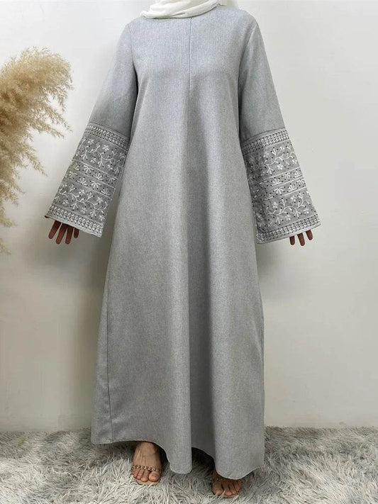 Fabaya UK stylish muslim abaya for women in light gray with embroidered wide sleeves